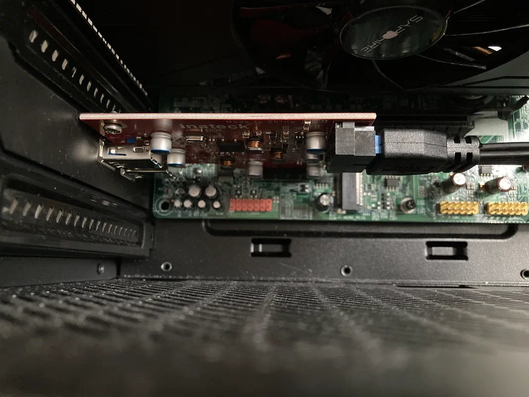 PCIe to USB 3.0 internal header adapter, and dust.
